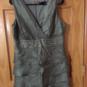 sleeveless cocktail dress.